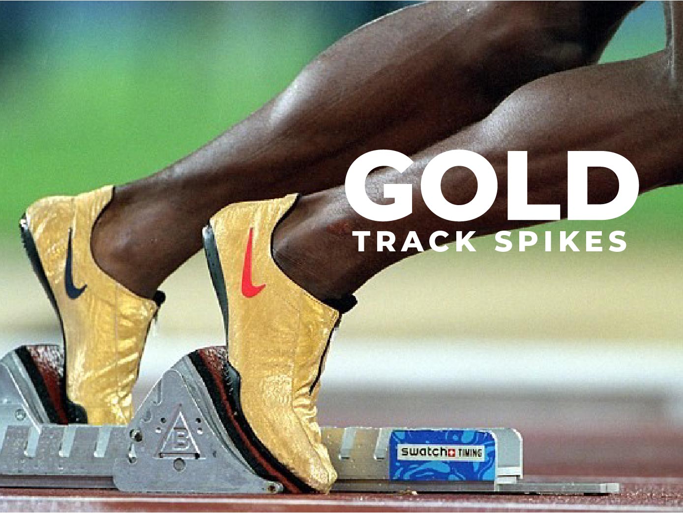 Gold track and field spikes