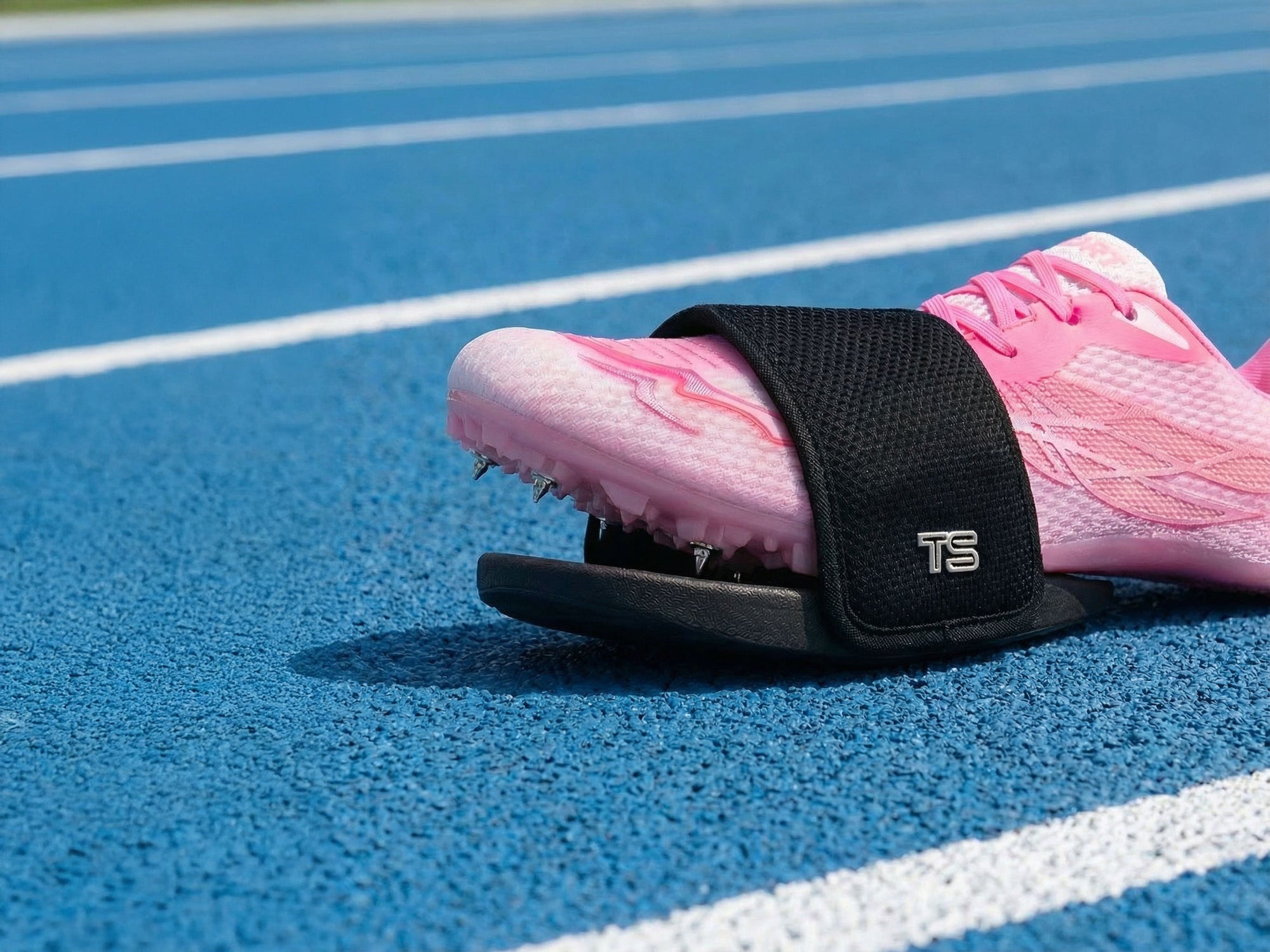 Track spikes covers shield