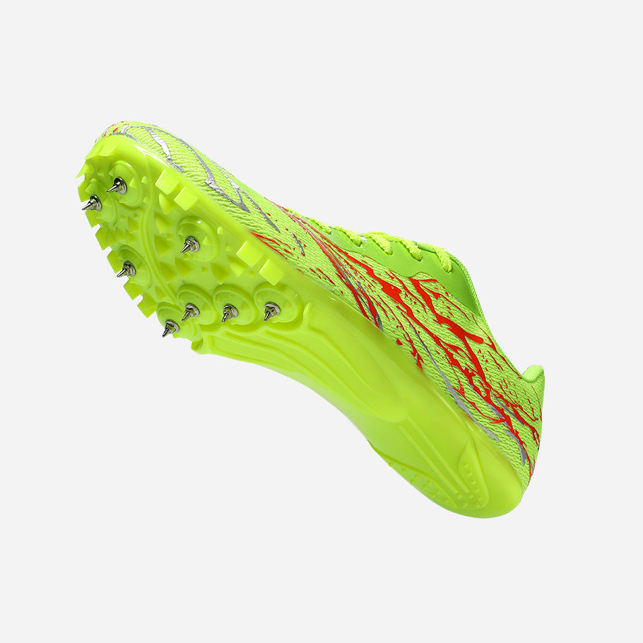 Bright green cleated athletic shoe on a light gray background