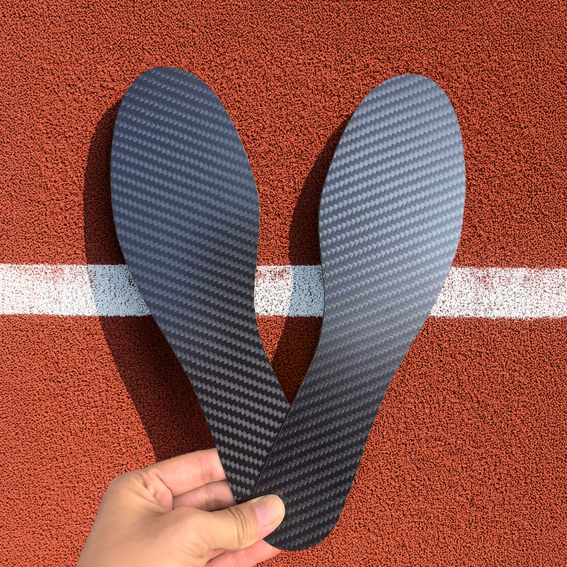 Carbon Fiber X Track Insoles to make to faster and jump higher