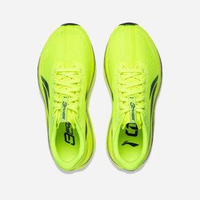 A pair of bright neon yellow running shoes shown from a top-down view on a light gray background.