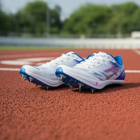 White running track spikes with blue and purple accents on a track