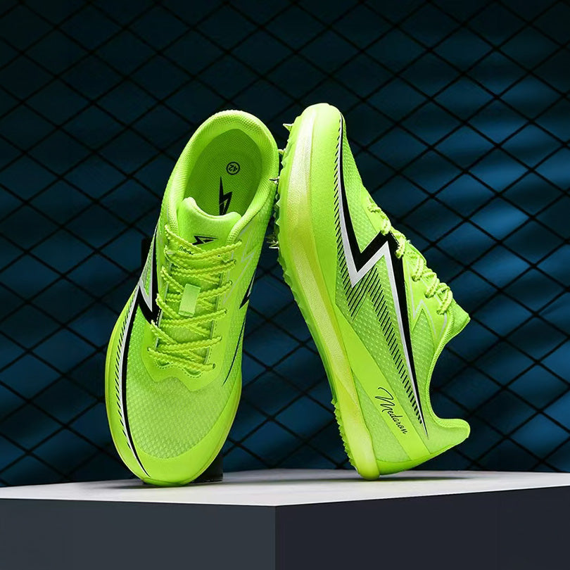 A pair of bright neon yellow-green athletic track shoes displayed on a white platform against a dark blue textured background. The shoes feature black and white graphic accents, including a prominent lightning bolt design on the side.